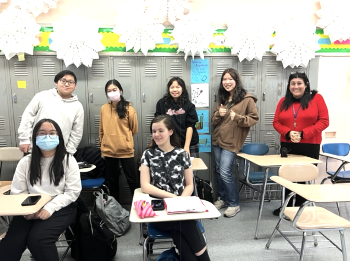 The Public Speaking Club poses for a photo during one of its meetings. Photo by the Public Speaking Club.